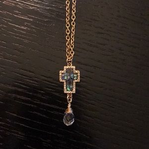 Cross necklace with gold chain and abalone stone